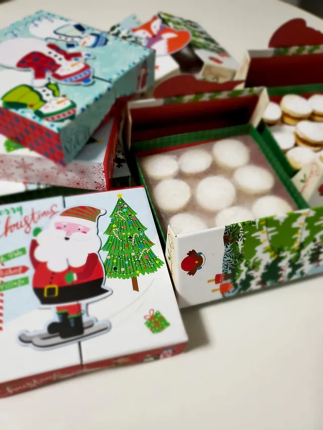 Christmas boxes filled with powdered alfajores